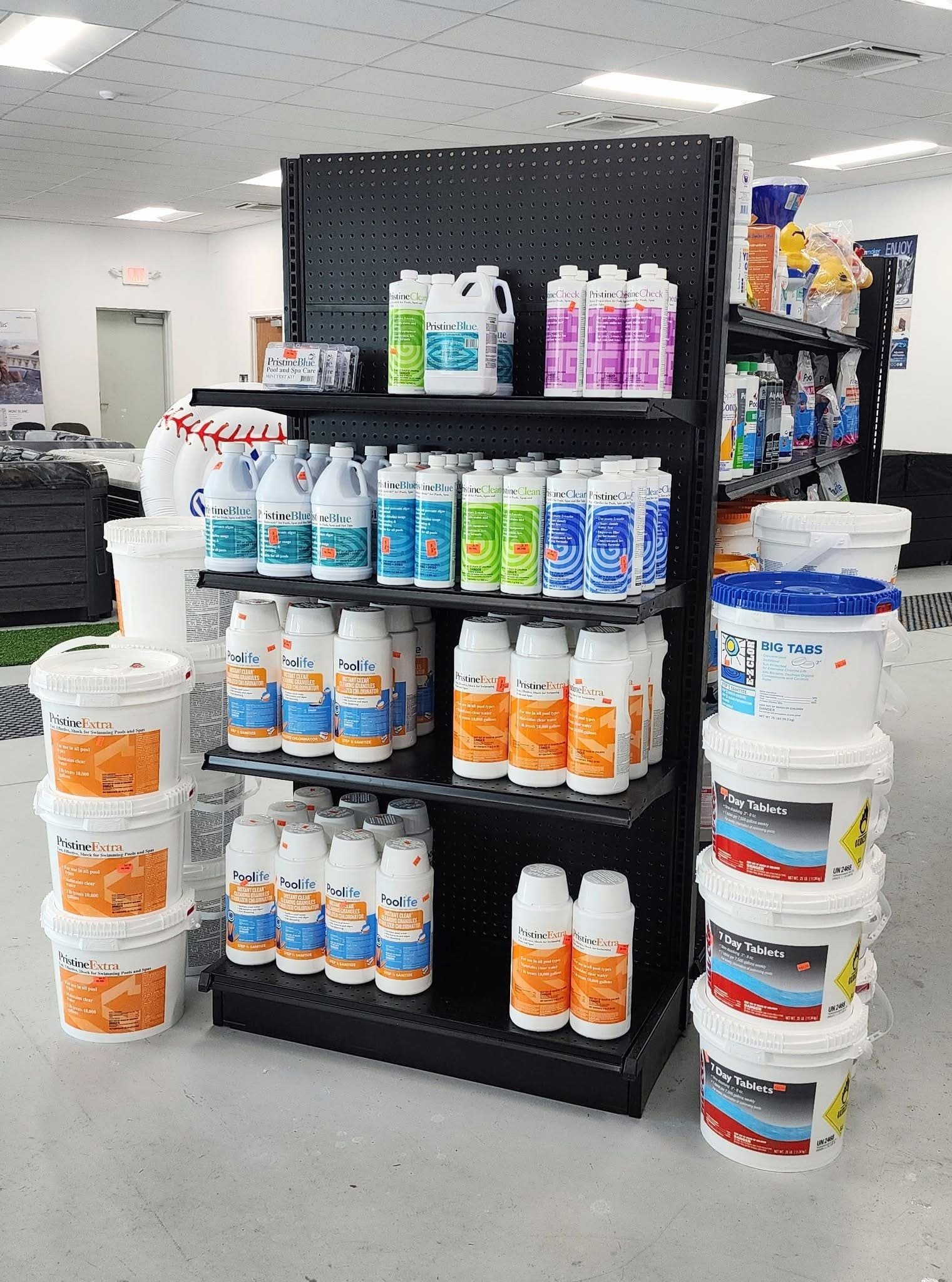 Pool Chemicals At Mr. Pool of Pasco & Crystal River 3 A shelf full of PristineBlue pool and spa treatment products